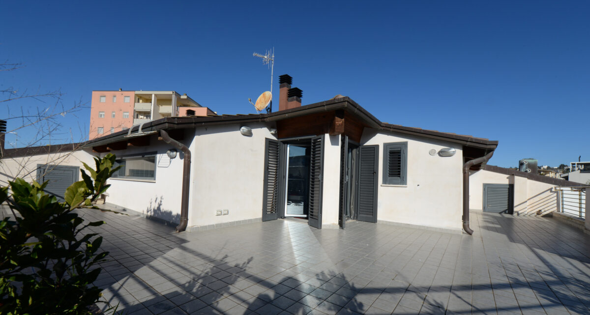Elegante Duplex con Terrazzo Panoramico